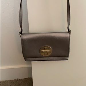 darker silver/ shined grey color. Great condition